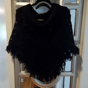 Rampage Poncho in black. One size fits all.